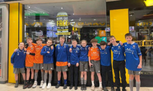 Blue and orange team outside Wing Kingz